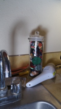 button jar and mini-vac with sink